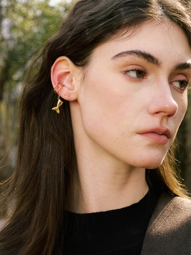 Adjustable contemporary clip on fish ear bone earrings - product image