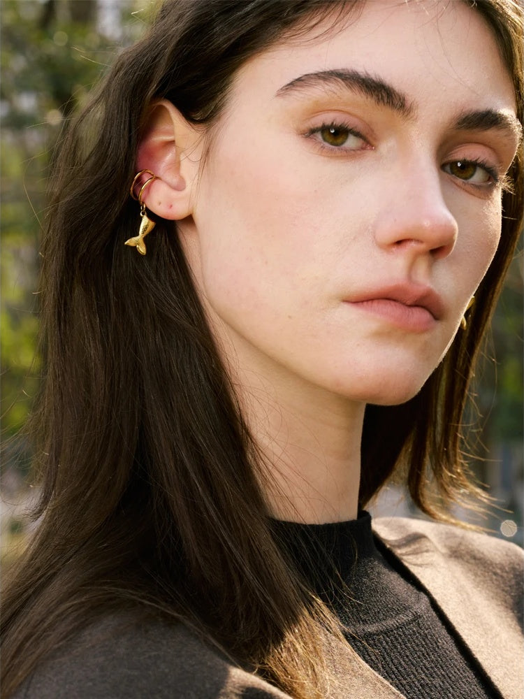 Adjustable contemporary clip on fish ear bone earrings - product image