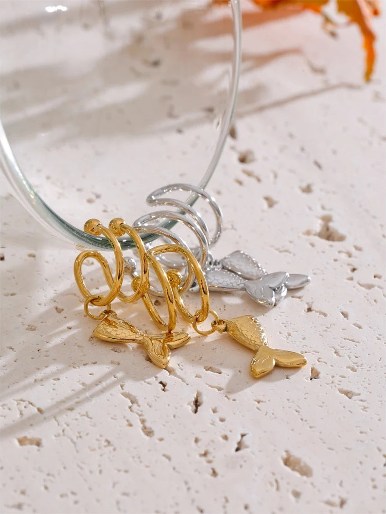 Adjustable contemporary clip on fish ear bone earrings - product image