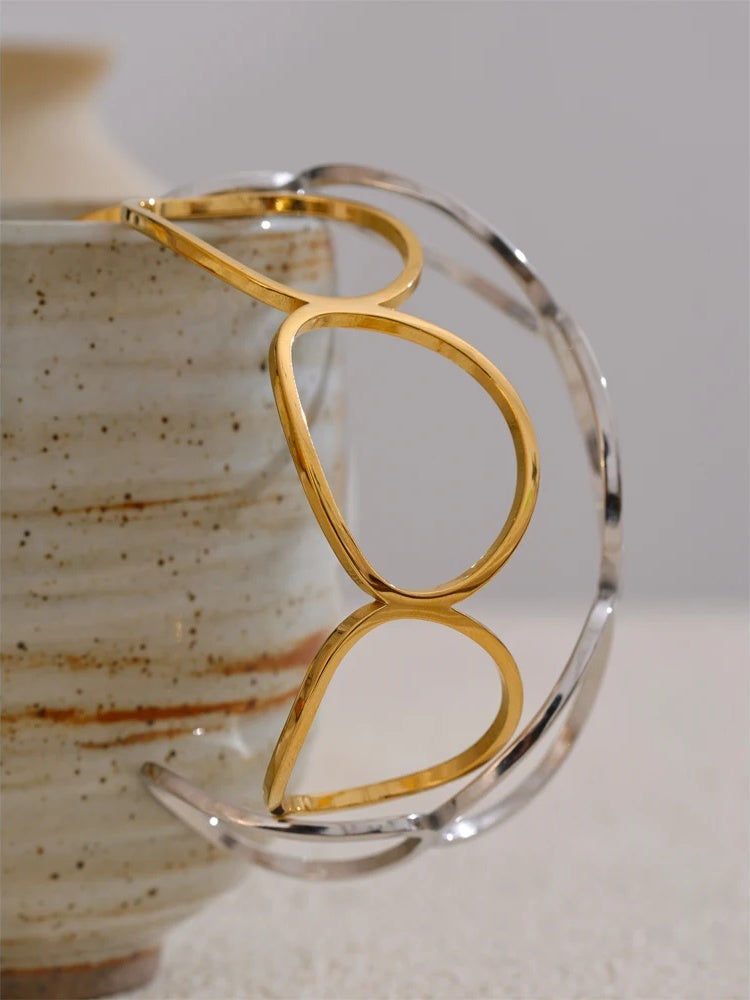 Adjustable hollow contemporary stainless steel cuff bracelet - product image