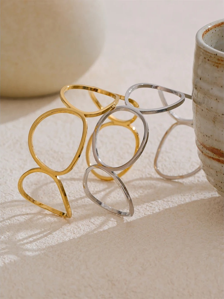 Adjustable hollow contemporary stainless steel cuff bracelet - product image