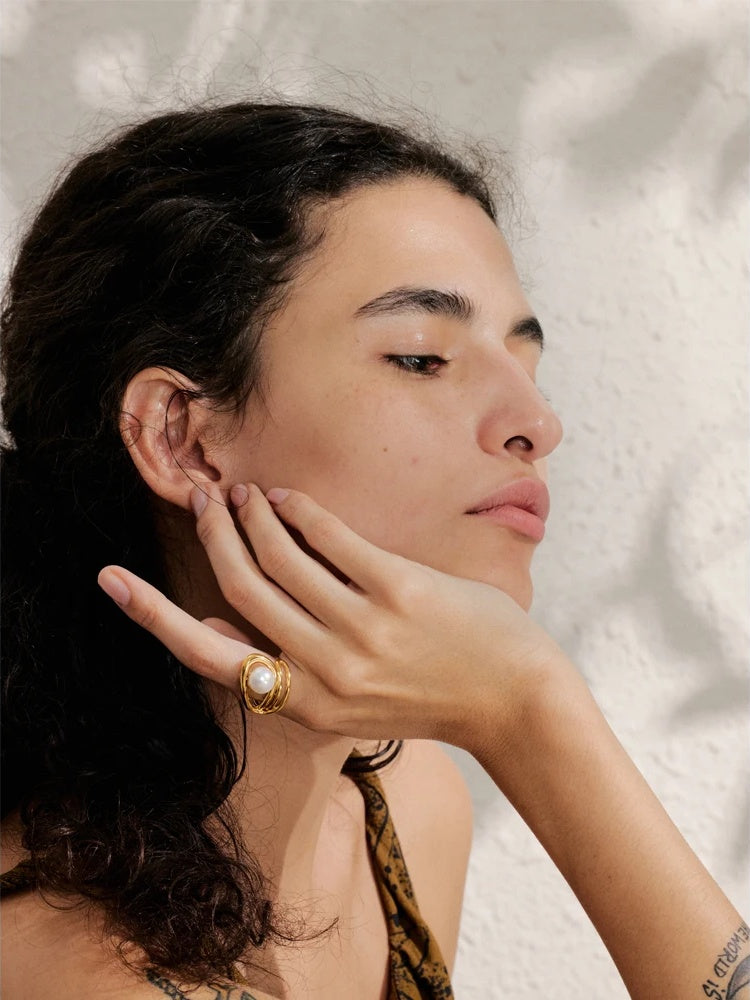 Adjustable simulated pearl contemporary hollow resizable ring - product image