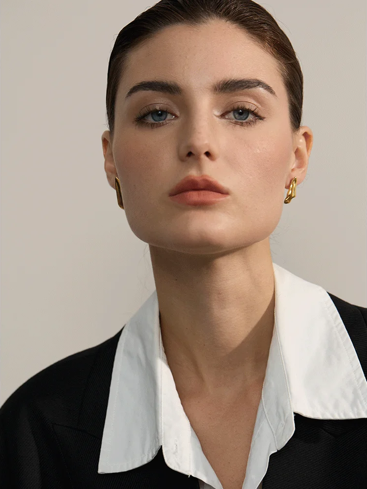 Asymmetrical geometry metal stud earrings gold - product image