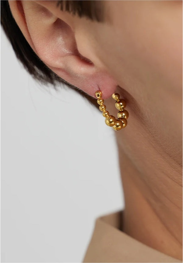Bead round hollow simple gold color hoop earrings - product image