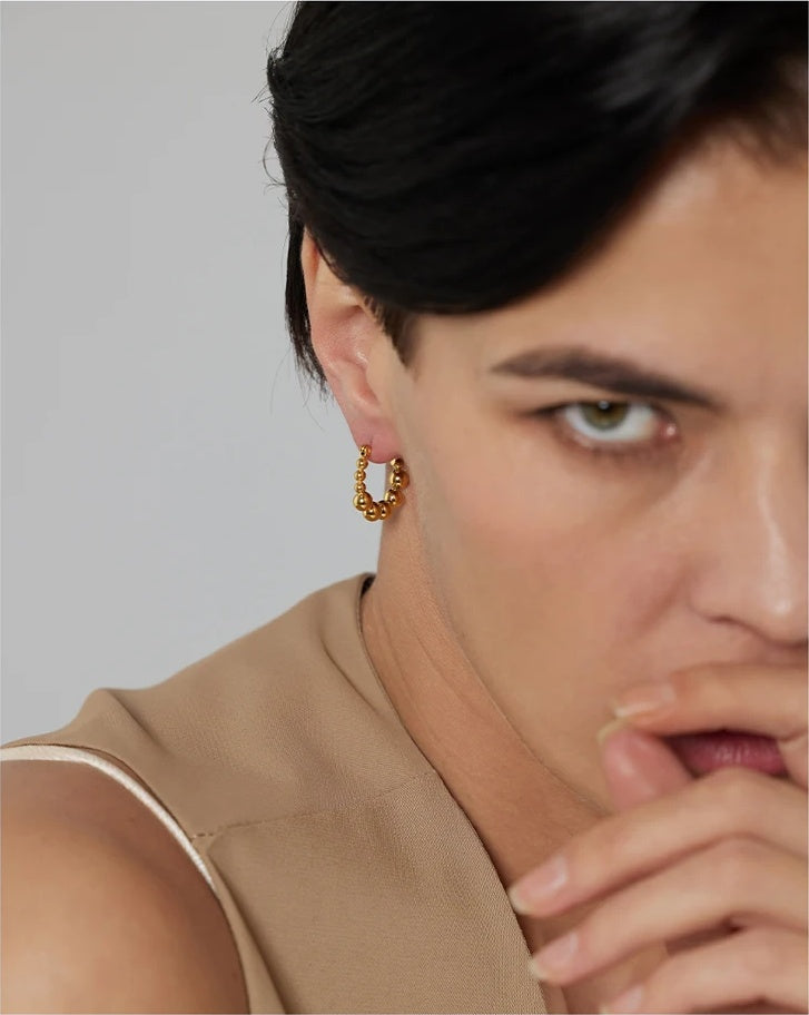 Bead round hollow simple gold color hoop earrings - product image