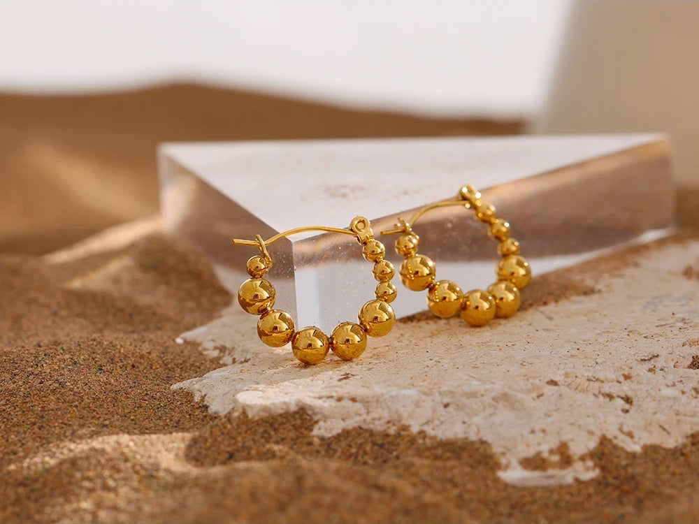 Bead round hollow simple gold color hoop earrings - product image