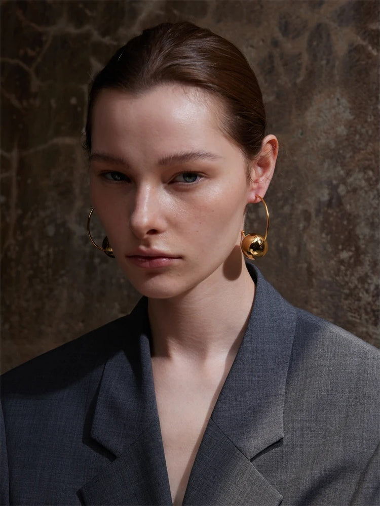 Big round c-shape huggie smooth earrings - product image