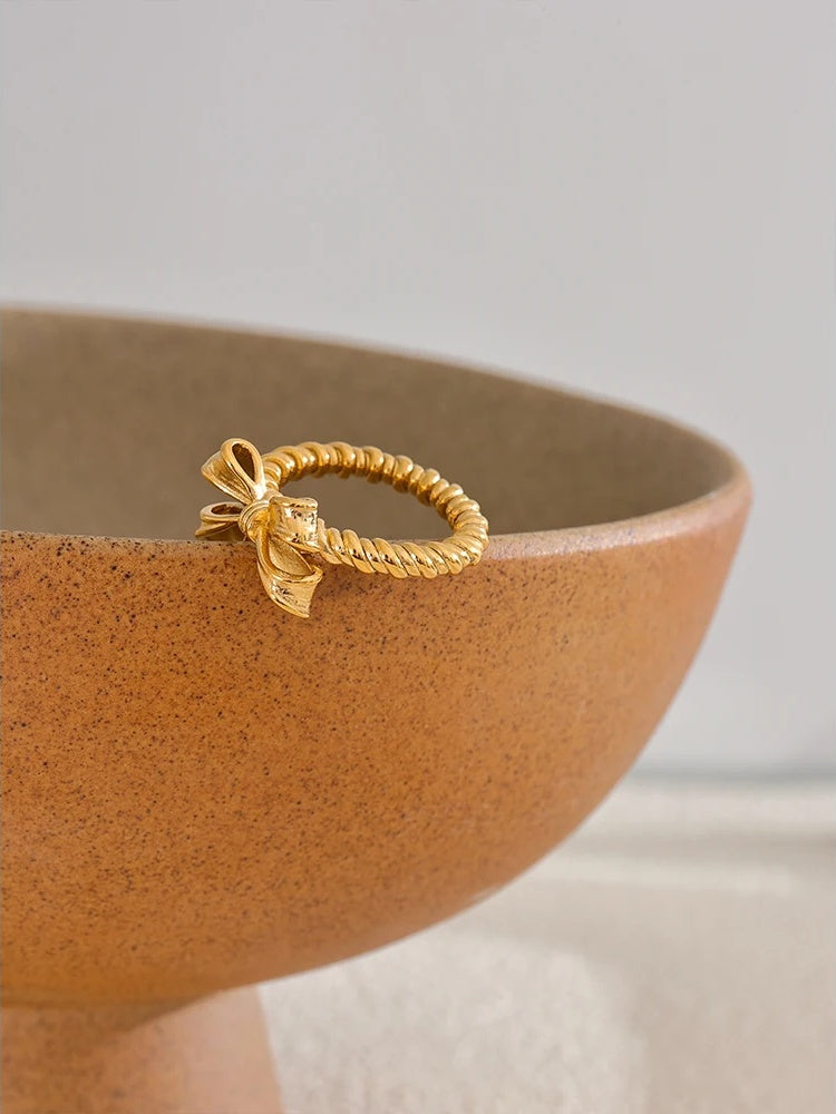 Bow knot design gold color fashion ring - product image