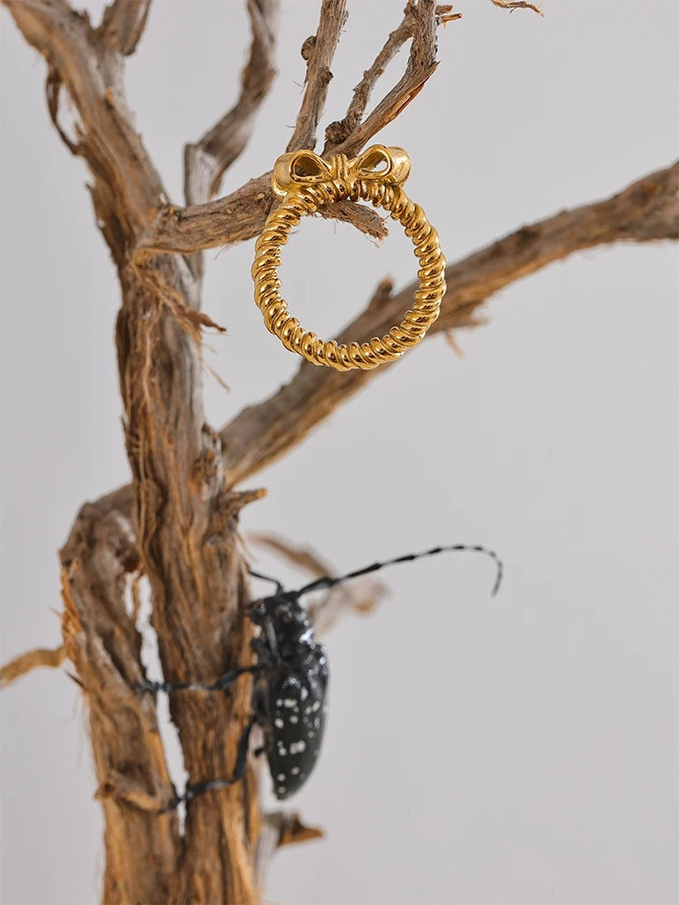 Bow knot design gold color fashion ring - product image