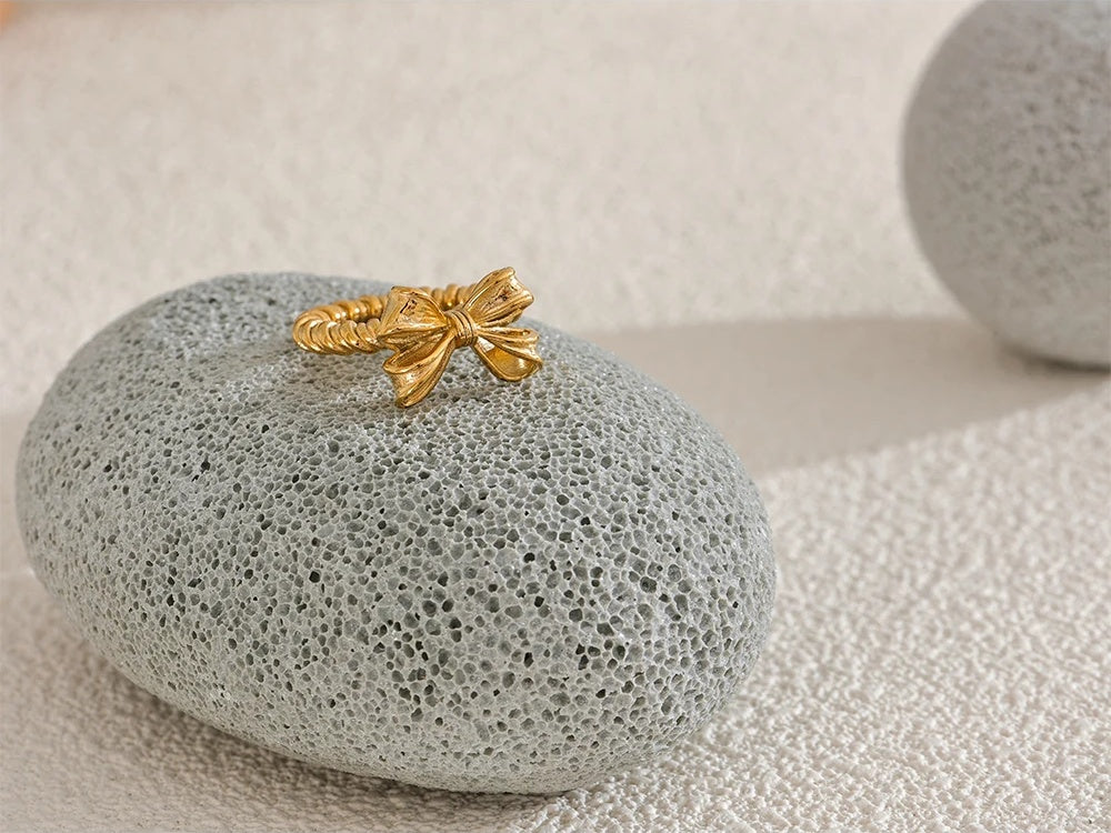 Bow knot design gold color fashion ring - product image