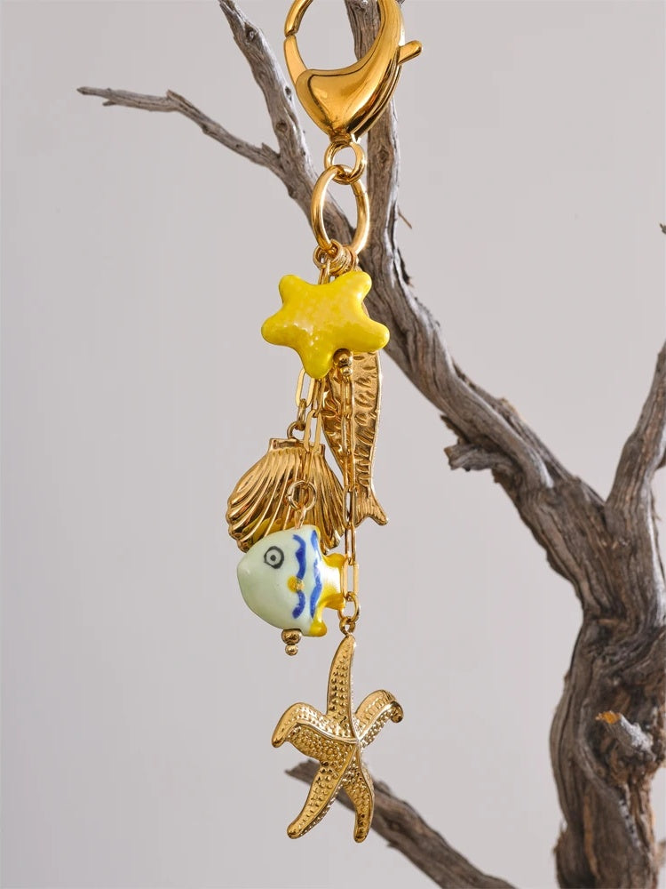 Ceramic fish shell starfish key chain - product image