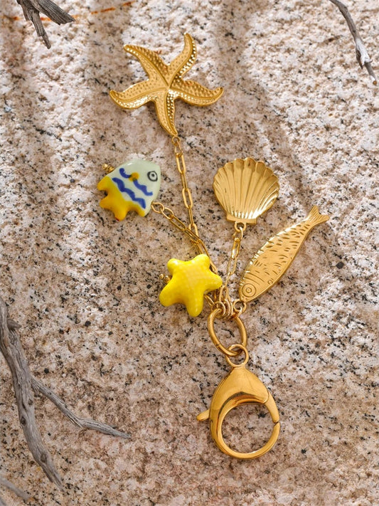 Ceramic fish shell starfish key chain - product image