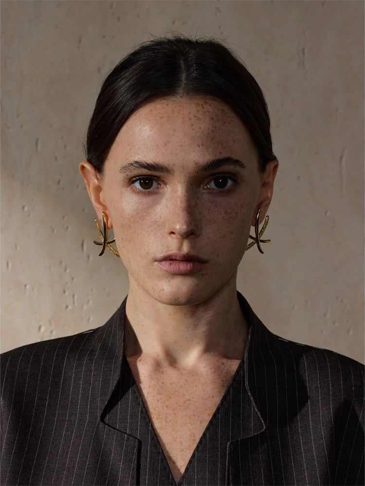 Contemporary push-back gold silver stud earrings - product image