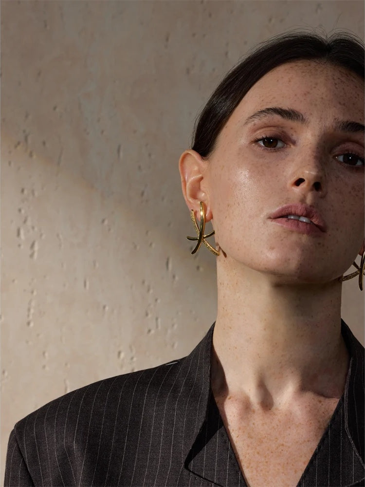 Contemporary push-back gold silver stud earrings - product image