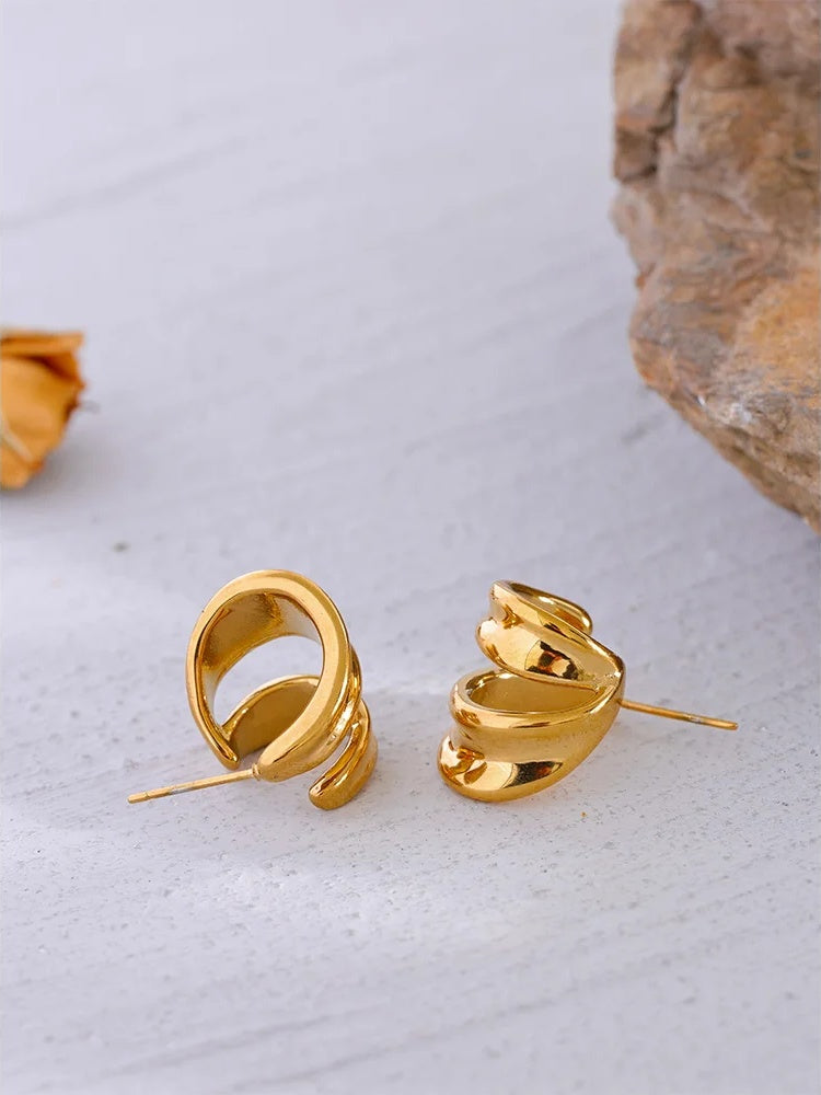 Contemporary unusual huggie metal texture earrings - product image