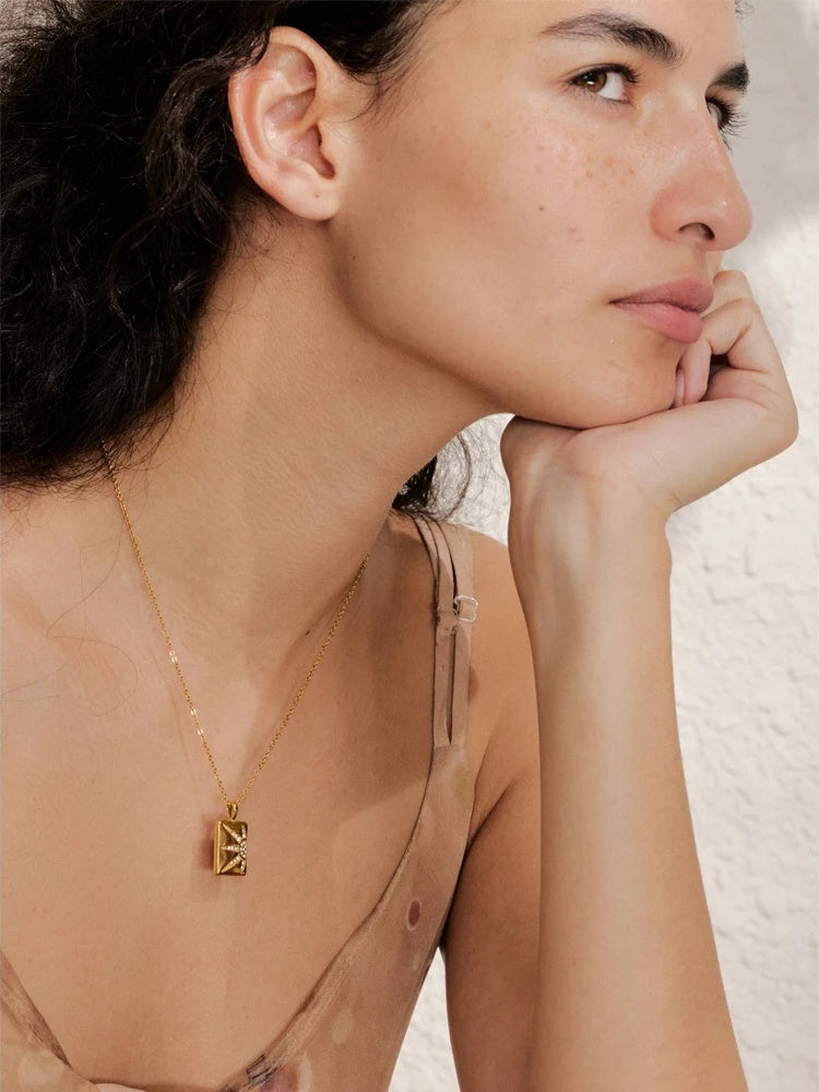 Cubic zirconia sun charm pendant necklace - product image