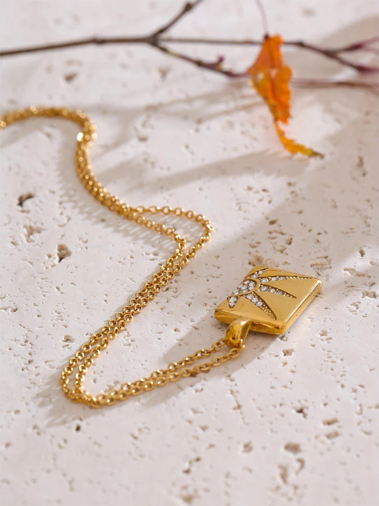 Cubic zirconia sun charm pendant necklace - product image