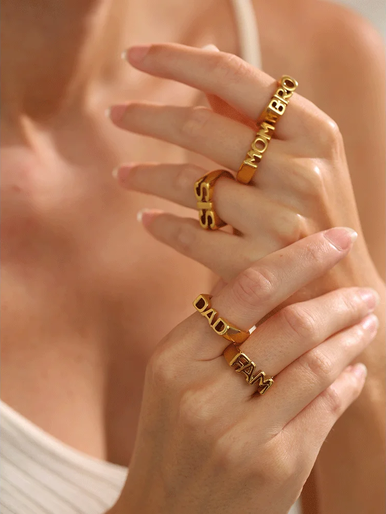 Family letter cast texture gold color statement ring - product image