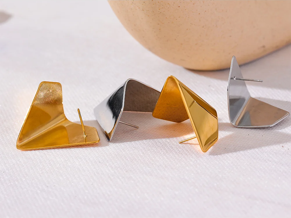 Glossy smooth modern metal stud earrings - product image