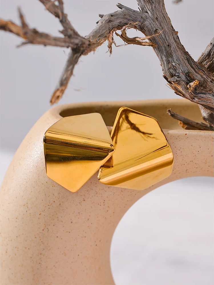 Glossy smooth modern metal stud earrings - product image