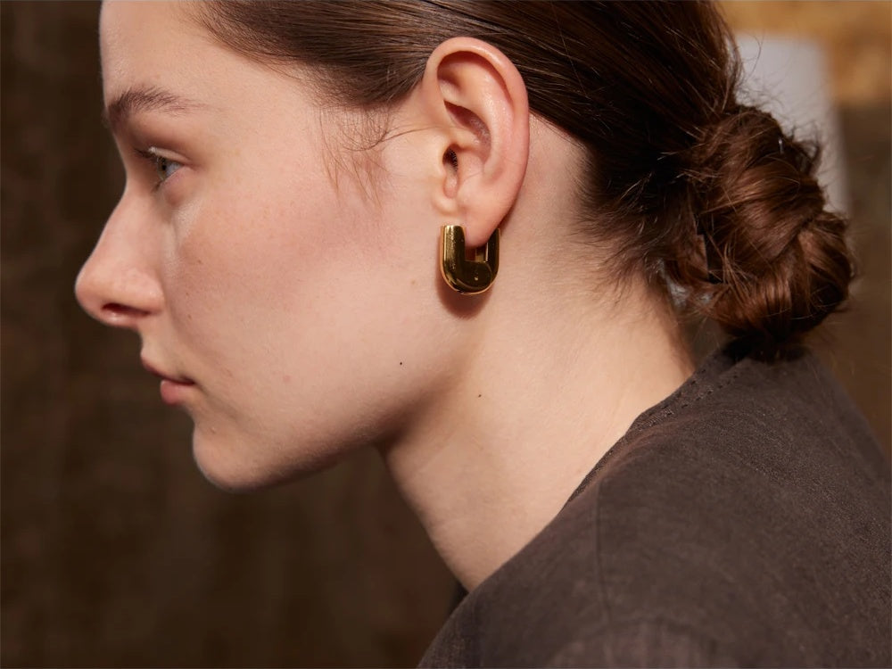 Glossy u-shape hollow hoop earrings - product image