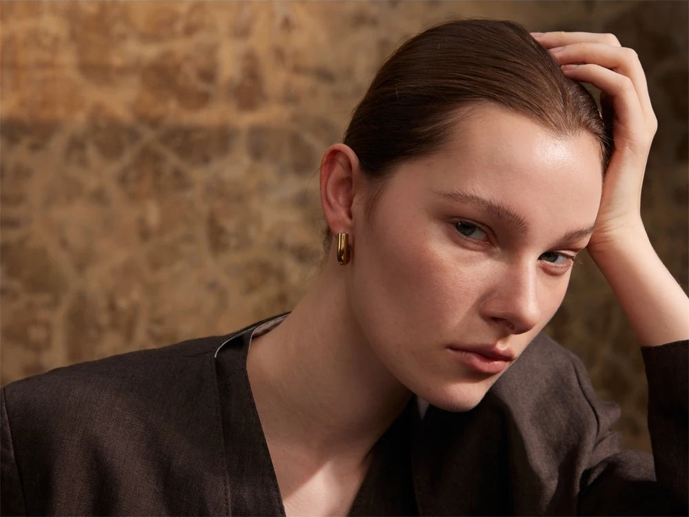 Glossy u-shape hollow hoop earrings - product image