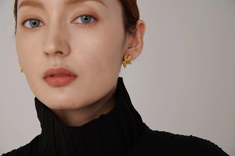 Golden flower texture stud earrings women - product image