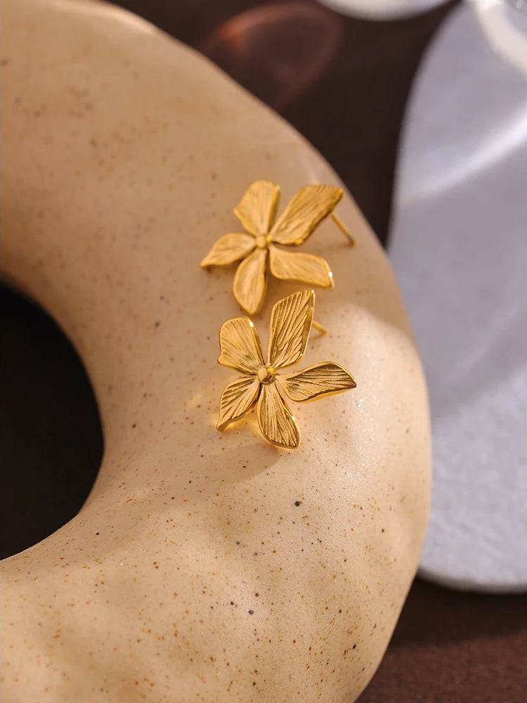 Golden flower texture stud earrings women - product image