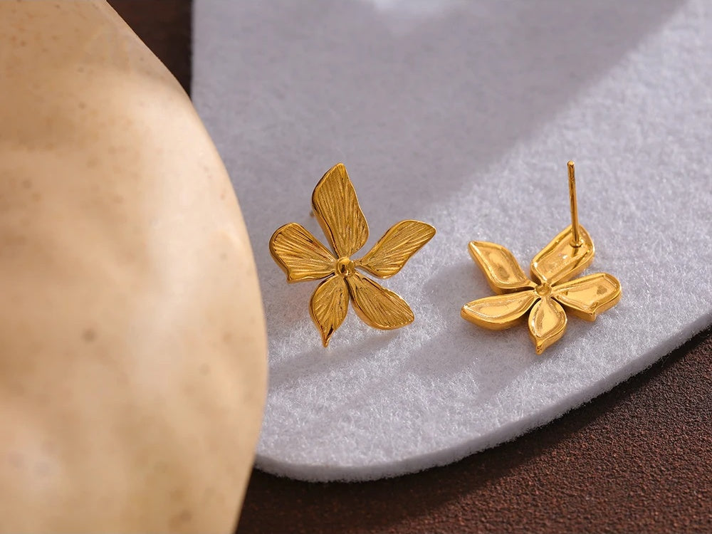 Golden flower texture stud earrings women - product image