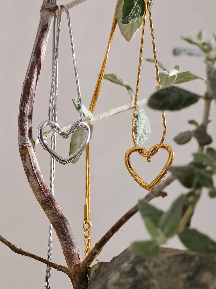 Golden stainless steel heart hollow pendant necklace - product image
