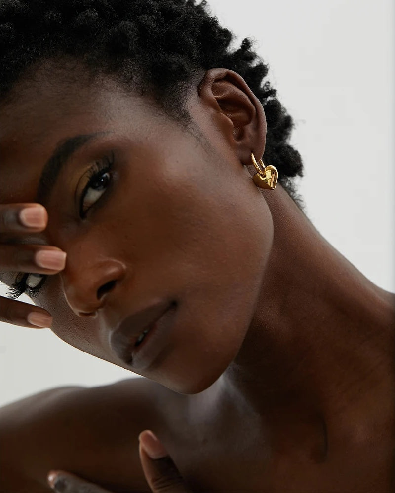 Heart huggie abstract golden fashion hoop earrings - product image