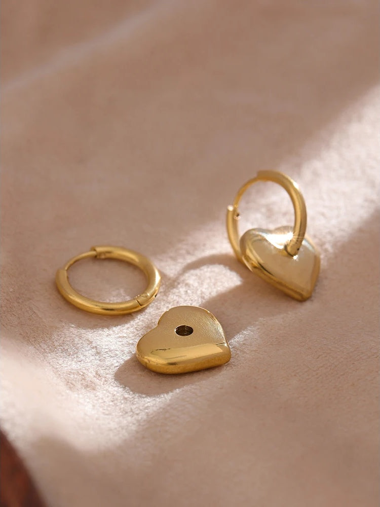 Heart huggie abstract golden fashion hoop earrings - product image