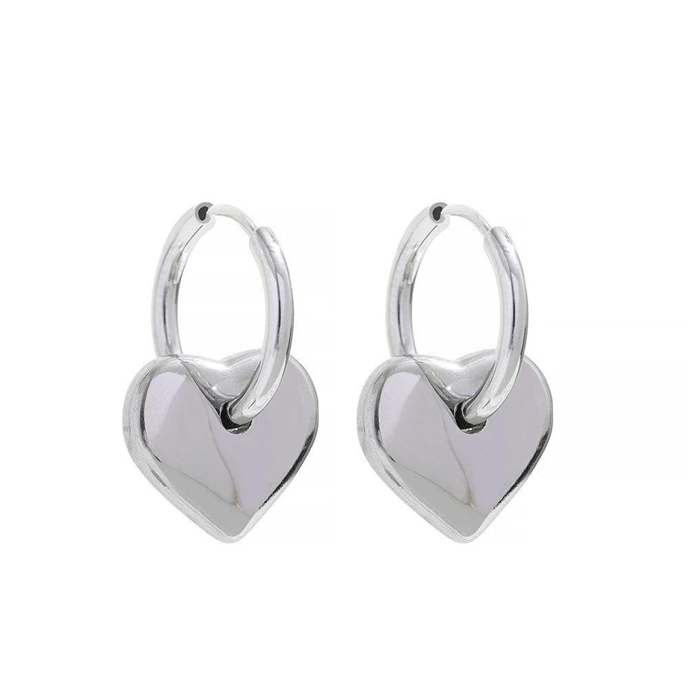 Heart huggie abstract golden fashion hoop earrings - product image