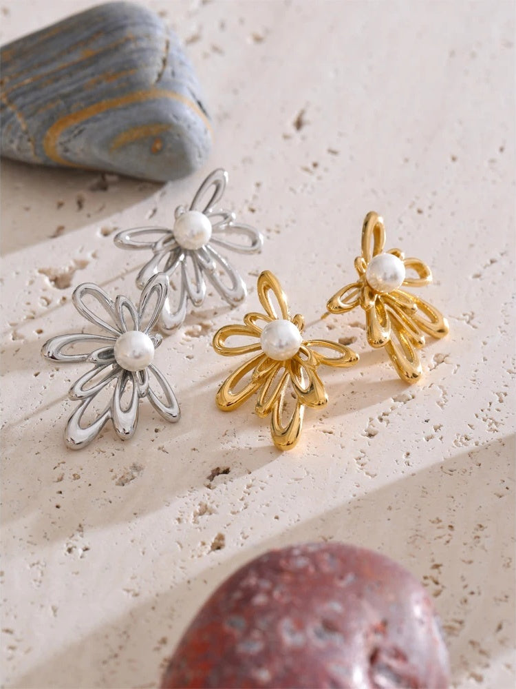 Hollow flower imitation pearls stud earrings - product image
