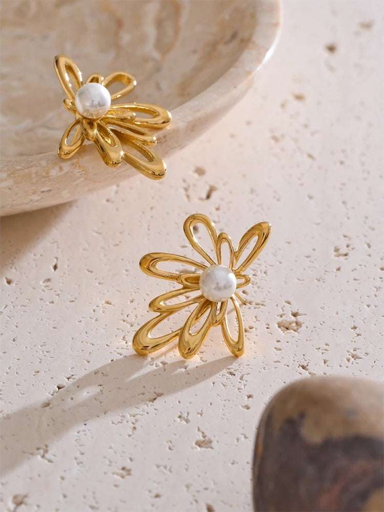 Hollow flower imitation pearls stud earrings - product image