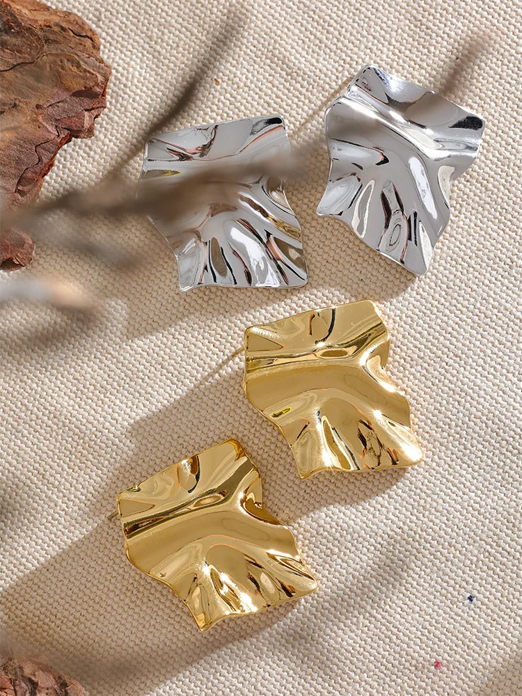 Large abstract metal texture stud earrings - product image