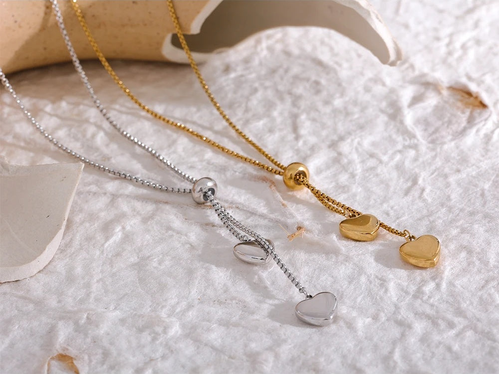 Long heart pendant gold color pull-out necklace - product image