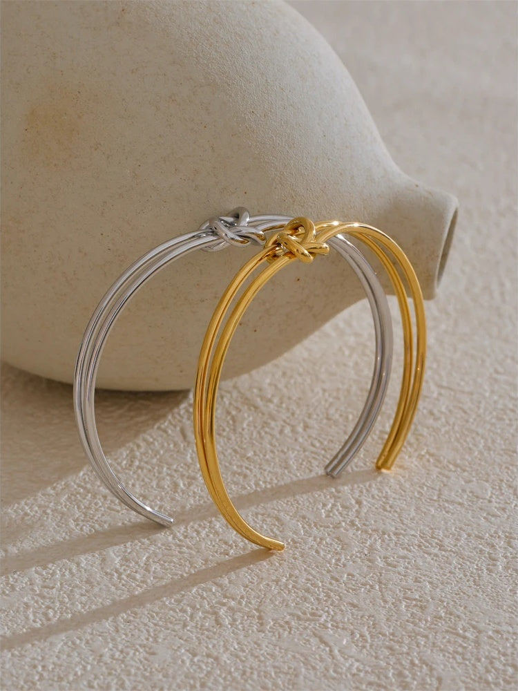Metal knot open cuff water resistant bracelet - product image