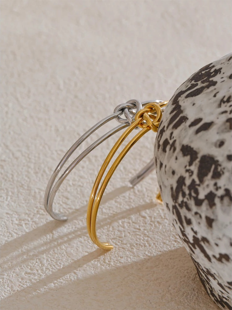 Metal knot open cuff water resistant bracelet - product image