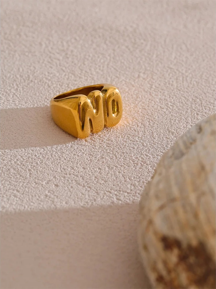 Metal on letter cast smooth ring - product image