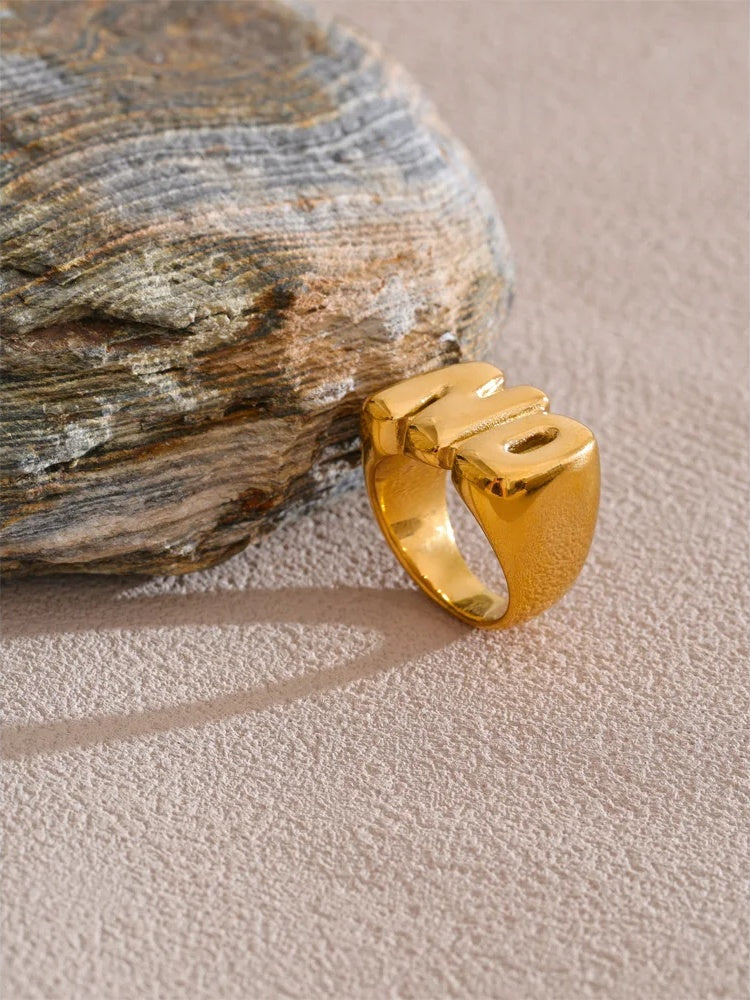 Metal on letter cast smooth ring - product image