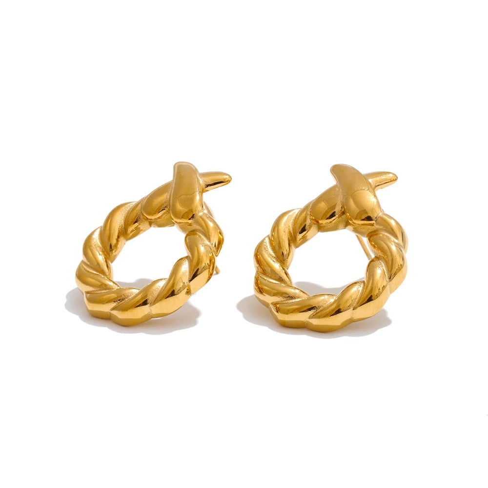 Metal round hollow modern stud earrings - product image