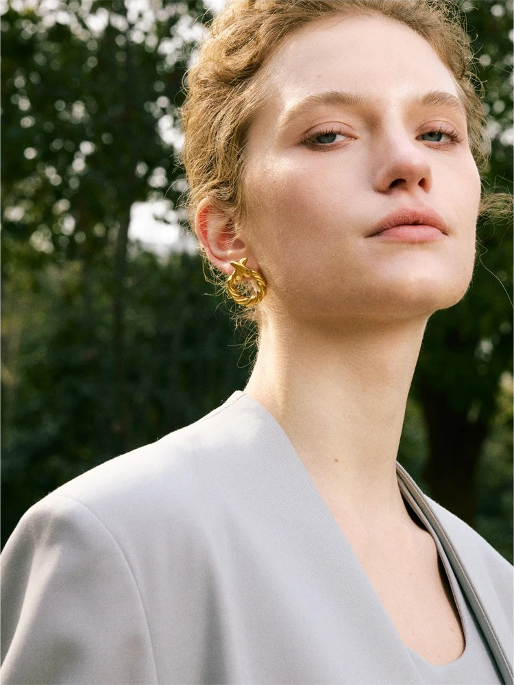 Metal round hollow modern stud earrings - product image