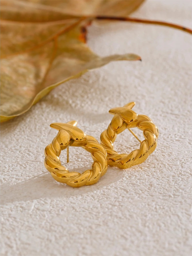 Metal round hollow modern stud earrings - product image