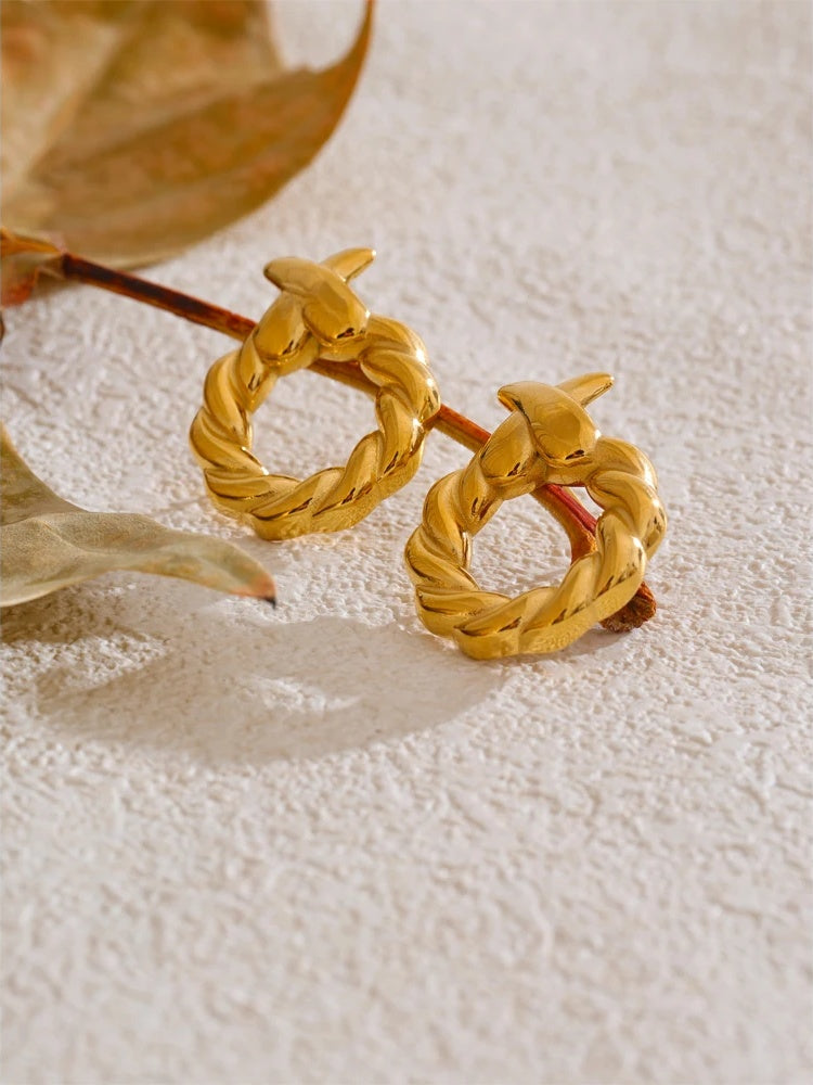 Metal round hollow modern stud earrings - product image