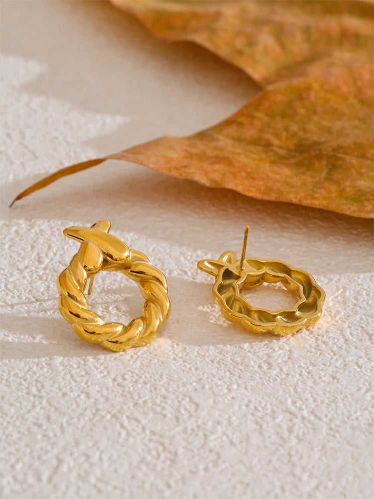 Metal round hollow modern stud earrings - product image