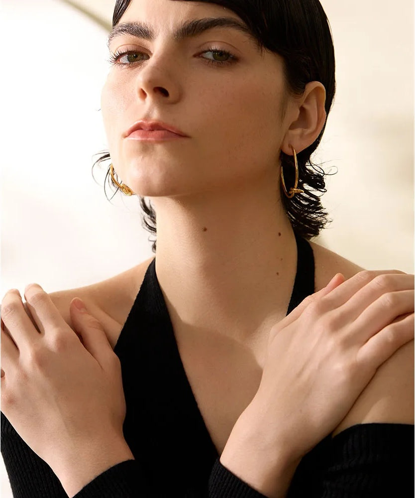 Minimalist knot huggie hoop earrings women - product image