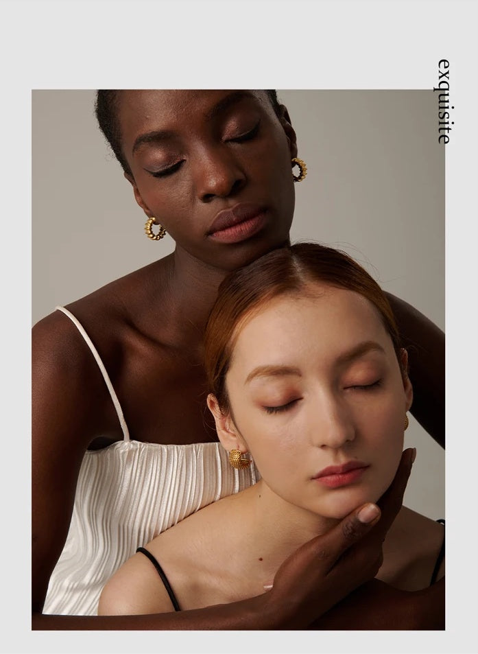 Minimalist statement stud earrings gold color - product image