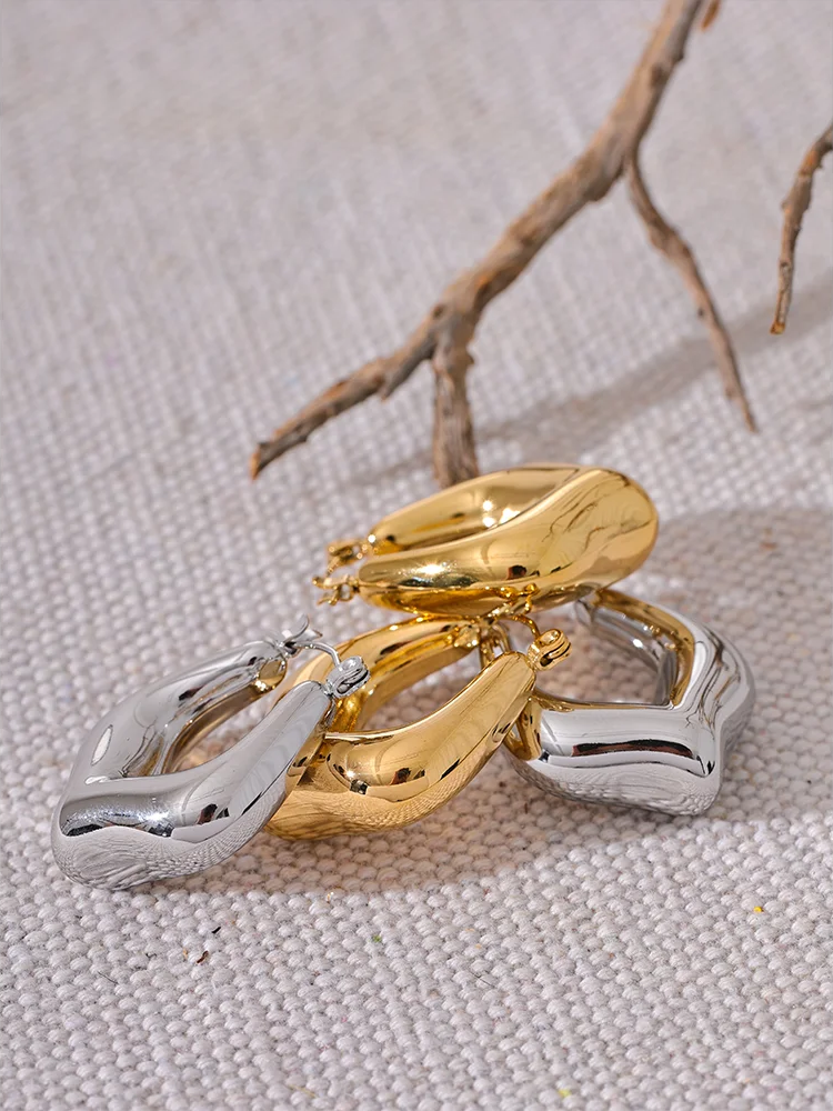 Modern hollow chunky smooth rust proof hoop earrings - product image