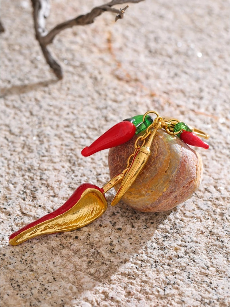 Red enamel resin chilli handbag keychain pendant - product image